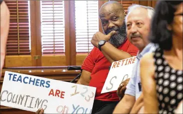  ?? LYNDA M. GONZALEZ PHOTOS / AMERICAN-STATESMAN ?? Charles Runnels, a retired bus driver, listens during a press conference by the Texas AFT Retiree Committee on Thursday. It is asking for money to reduce premiums to 2017 levels.