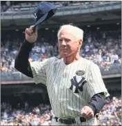  ?? JIMMCISAAC— GETTY IMAGES, FILE ?? Whitey Ford is introduced during the New York Yankees’ 64th old timers day in 2010at Yankee Stadium.