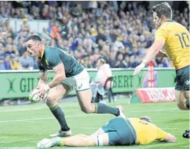  ??  ?? South Africa’s Jesse Kriel scores a try against Australia.