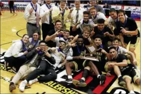  ?? KIRK NEIDERMYER - FOR DIGITAL FIRST MEDIA ?? Berks Catholic wins the BCIAA Boys Basketball Championsh­ip at Santander Arena in Reading on Wednesday, February 14, 2018.