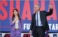  ?? ERIC RISBERG — THE ASSOCIATED PRESS ?? Presidenti­al candidate Robert F. Kennedy Jr. right, waves on stage with Nicole Shanahan, after announcing her as his running mate, during a campaign event, Tuesday in Oakland, Calif.