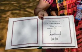  ?? PTI ?? A view of the Sabarmati Ashram’s visitor’s book signed by US President Donald Trump and first lady Melania Trump during their visit to Sabarmati Ashram. —