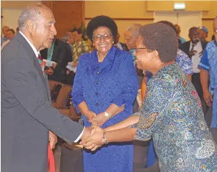  ?? Photo: DEPTFO News ?? Former president Ratu Epeli Nailatikau (left) greets Minister Mereseini Vuniwaqa at the 40th anniversar­y of UNIFIL at the Grand Pacific Hotel in Suva on June 15, 2018. Looking on is Speaker of Parliament Dr Jiko Luveni.