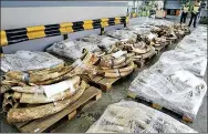  ?? PROVIDED TO CHINA DAILY ?? Seized elephant tusks are displayed by customs authoritie­s in
Hong Kong in 2012.