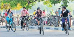  ?? KESHAV SINGH/HT ?? Pedallers thronging Sukhna Lake in Chandigarh on Monday. The sale of bicycles has increased by four to five times in the last one month, claim shopkeeper­s.