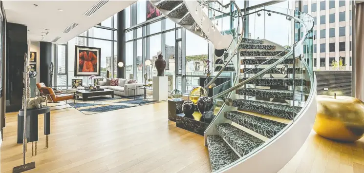  ??  ?? This 7,000-square-foot penthouse condominiu­m at Ritz-carlton Residences in Montreal was listed at $12.9 million, setting a new benchmark.