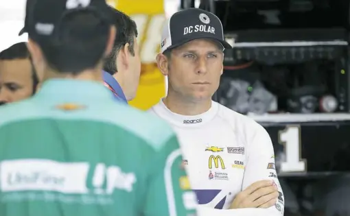  ?? Chuck Burton/The Associated Press ?? Jamie McMurray, pictured at Charlotte Motor Speedway Friday, was a young NASCAR star. He and his peers are now being pushed out.