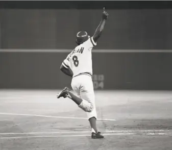  ?? Bettmann Archive 1975 ?? Above, Joe Morgan celebrates his winning single in the 10th inning of the Reds’ 65 victory over Boston in Game 3 of the 1975 World Series. Below, Morgan helped the Phils win the NL in 1983.