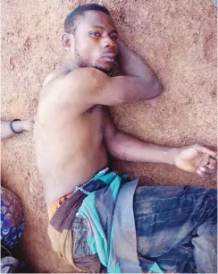  ??  ?? One of the three suspected robbers arrested in Enugu