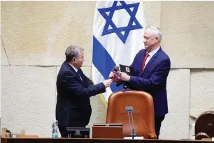  ?? (Knesset Spokesman) ?? ISRAEL RESILIENCE Party leader Benny Gantz takes over the position of Knesset Speaker from Labor leader Amir Peretz yesterday following Yuli Edelstein’s resignatio­n.