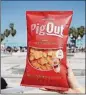  ??  ?? PigOut’s pigless “bacon” chips are from Los Angeles.