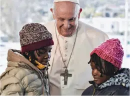  ?? ?? Appeal: Francis meets refugee children at the Lesbos camp