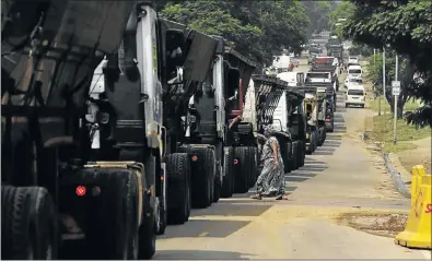  ?? PHOTO: THULANI MBELE ?? Coal trucks companies, coal suppliers and coal miners caused a major traffic in Pretoria yesterday morning during their march to the Union Buildings.