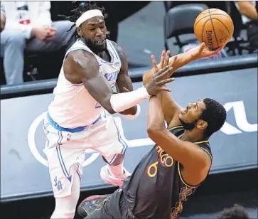  ?? DESPITE A POOR Nam Y. Huh Associated Press ?? second half, the Lakers closed out a win Saturday with help from Montrezl Harrell, left.