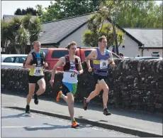  ?? 01_B21race05 ?? Leading the pack from the start of the race are eventual first and second place winners, Tom Owens and John Yells.