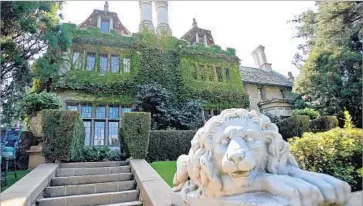  ?? Gabriel Bouys AFP/Getty Images ?? THE 29-ROOM Gothic Tudor estate includes chef’s and catering kitchens, a game room, a wine cellar and a screening room with a built-in pipe organ. The 20,000-square-foot floor plan also includes 12 bedrooms.