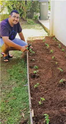  ??  ?? Manauwar Khan beside his garden at his home on Fantasy Island in Nadi.