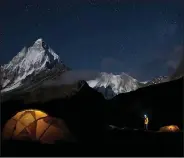  ??  ?? Married couple Jimmy Chin and Elizabeth Chai Vasarhelyi wrote, directed and produced 2015’s Meru, a climbing documentar­y about the first ascent of the “Shark’s Fin” route on Meru Peak in the Indian Himalayas.
