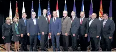  ?? PAUL DALY/THE CANADIAN PRESS ?? Lawmakers pose for a photo at the Conference of New England Governors and Eastern Canadian Premiers in St.John’s, N.L., in 2015. Eastern Canadian premiers are stressing the need to make Canada’s case on cross-border trade at every opportunit­y in the...