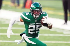  ?? Adam Hunger / Associated Press ?? Jets running back Ty Johnson rushed for a career-high 104 yards and a touchdown last week against the Raiders.