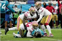  ?? JOHN RAOUX/ AP ?? Wth 49ers opponents focused on trying to neutralize Nick Bosa, other defensive linemen are able to create pressure, including ( from left) Javon Hargrave, Clelin Ferrell and Arik Armstead.