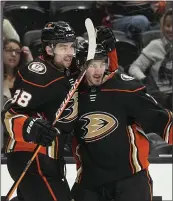  ?? MARK J. TERRILL – THE ASSOCIATED PRESS ?? The Ducks' Jayson Megna, right, celebrates his goal with Derek Grant during the first period on Friday night.