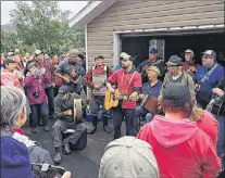  ??  ?? Musicians at Saturday afternoon’s Shed Crawl.