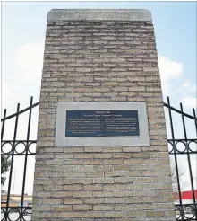  ?? CLIFFORD SKARSTEDT EXAMINER ?? A plaque honouring the historic site of De Laval Cream Separator Co. is seen Friday on the northwest corner of Park and Lansdowne streets opposite Kawartha TV and Stereo. Friday was the final day of operation for De Laval in Peterborou­gh after its office at 150B Jameson Dr. closed.