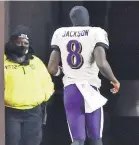  ?? DAVID RICHARD/ AP ?? Ravens quarterbac­k Lamar Jackson had to leave a game with cramping suspected to be a result of his bout with COVID- 19.