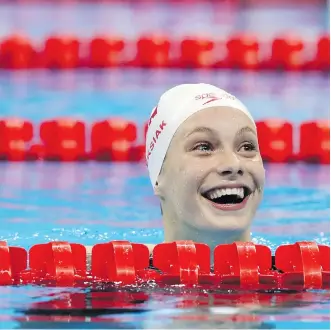  ?? THE ASSOCIATED PRESS/FILES ?? Penny Oleksiak, here after winning gold and setting a new Olympic record in the women’s 100-metre freestyle in Rio, is now armed with wearable technology designed to help her swim even faster.