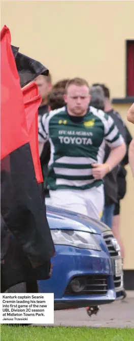  ?? Janusz Trzesicki ?? Kanturk captain Seanie Cremin leading his team into first game of the new UBL Division 2C season at Midleton Towns Park.