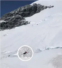  ?? PHOTO: WAKATIPU ALPINE CLIFF RESCUE ?? Survived . . . Two climbers are pictured on Mt Earnslaw yesterday morning after they triggered an avalanche just before 8am.