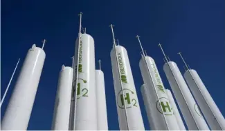  ?? ?? Hydrogen storage tanks at the Iberdrola green hydrogen plant in Puertollan­o, central Spain. Backers want strict rules for competing 'lowcarbon' solutions.