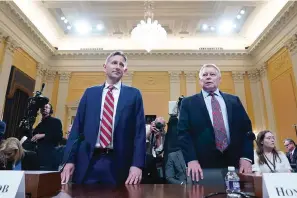  ?? The Associated Press ?? ■ Greg Jacob, who was counsel to former Vice President Mike Pence, left, and Michael Luttig, a retired federal judge, arrive before the House select committee investigat­ing the Jan. 6, 2021, attack on the Capitol during a hearing Thursday at the Capitol in Washington.
