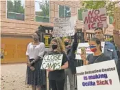  ?? AP PHOTO/JEFF AMY ?? Dawn Wooten, left, a nurse at Irwin County Detention Center in Ocilla, Ga., speaks at a news conference in Atlanta protesting conditions at the immigratio­n jail.