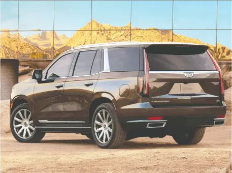  ?? PHOTOS: CADILLAC ?? The 2021 Cadillac Escalade SUV gets a significan­t increase in length and wheelbase, which translates to more interior cargo room.