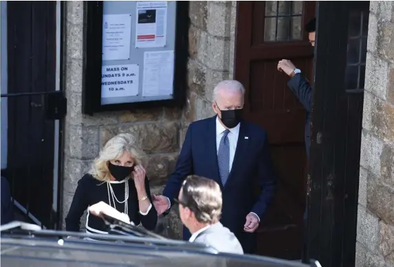  ?? GETTY IMAGES FILE PHOTOS ?? ATTENDING: President Biden and first lady Jill Biden leave church in St. Ives, England, after attending Mass last Sunday during the G7 Cornwall summit. Below, Biden arrives at Holy Trinity Catholic Church in Washington on June 5.