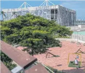  ??  ?? SWINGS AND ROUNDABOUT­S: A small playground near the Olympic Aquatics Stadium in Rio.