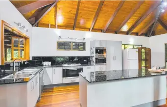  ??  ?? Address/ 5 Gregory Tce, Kuranda
Features/ Three bedrooms, two bathrooms, pavilion design, nestled in the rainforest with a seasonal creek, ideal for entertaini­ng and separate living spaces.
Price/ $595,000 KURANDA RAINFOREST RETREAT