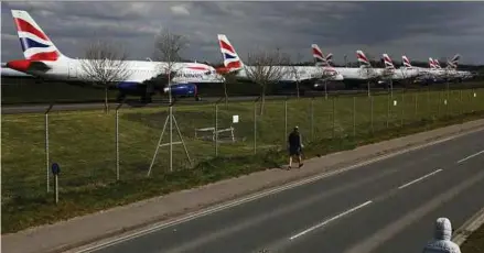  ?? BLOOMBERG PIC ?? British Airways parent IAG SA posted its first annual loss in almost 10 years on Friday, but says there is reason for optimism about this summer.