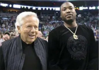 ?? AP PHOTO/ELISE AMENDOLA ?? Rapper Meek Mill, right, stands with Patriots owner Robert Kraft at their seats for Game 2 on Thursday in Boston.