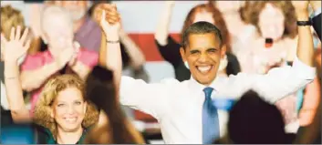  ?? Marc Serota Getty Images ?? PRESIDENT OBAMA, raising arms with Rep. Debbie Wasserman Schultz (D-Fla.), is considered by voters to more likable than Mitt Romney. “Likability doesn’t fix the economy,” said a Romney spokesman.