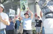  ?? NHAT V. MEYER — STAFF PHOTOGRAPH­ER ?? Joseline Elguea, from San Jose, protests on the corner of Stevens Creek Boulevard and Winchester Boulevard.