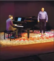  ??  ?? Baritone Eugene Brancovean­u, accompanie­d by Christophe­r Ray on piano, performs “Dichterlie­be” in a final dress reheral at Opera San Jose’s Fred Heiman Digital Media Studio.