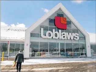  ?? CP PHOTO ?? A Loblaws store is seen Monday, March 9, 2015 in Montreal. Loblaw Companies Ltd. announced plans to roll out its grocery pick-up and delivery services across the country this year.