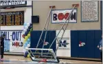  ?? RECORDER PHOTO BY MATTHEW BRADY ?? The basket on the east side of the Monache gym came down and shattered following Thursday’s playoff game.