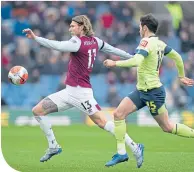  ??  ?? Burnley’s Jeff Hendrick gets away from Adam Smith