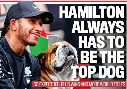 ??  ?? Legend: Hamilton celebrates surpassing Michael Schumacher’s 91 race wins with dog Roscoe