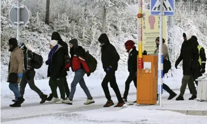  ?? ?? People arriving at the Salla border crossing in Finland on Wednesday. Photograph: Lehtikuva/Reuters