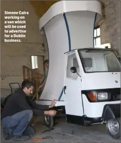  ??  ?? Simone Caira working on a van which will be used to advertise for a Dublin business.